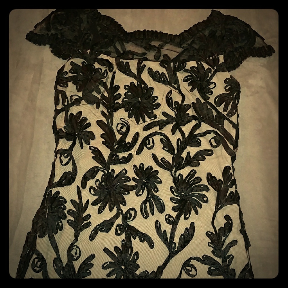 Like new Phoebe Couture black and nude mini dress